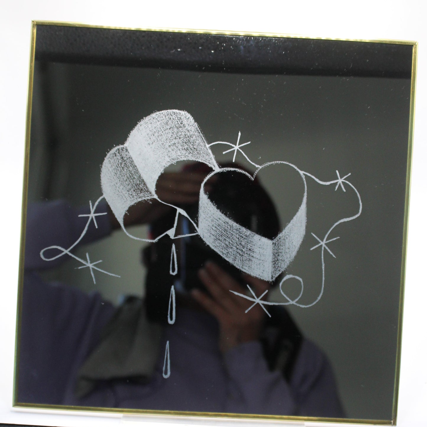 heart & teardrop tattooed mirror