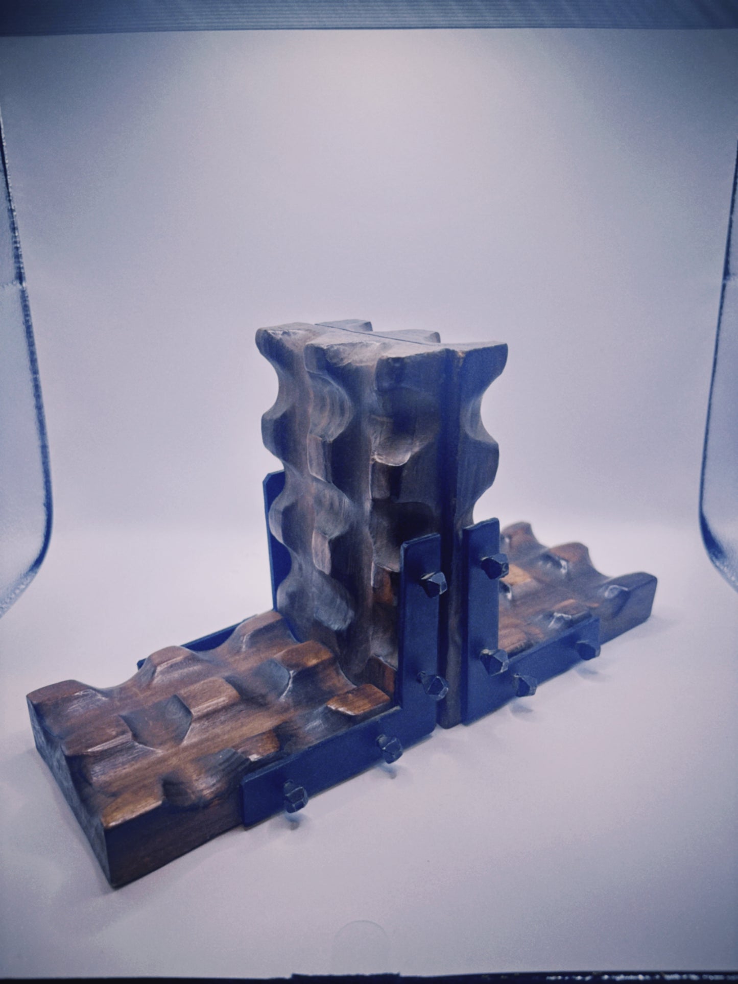 Handcarved wood & iron bookends w/ nailheads