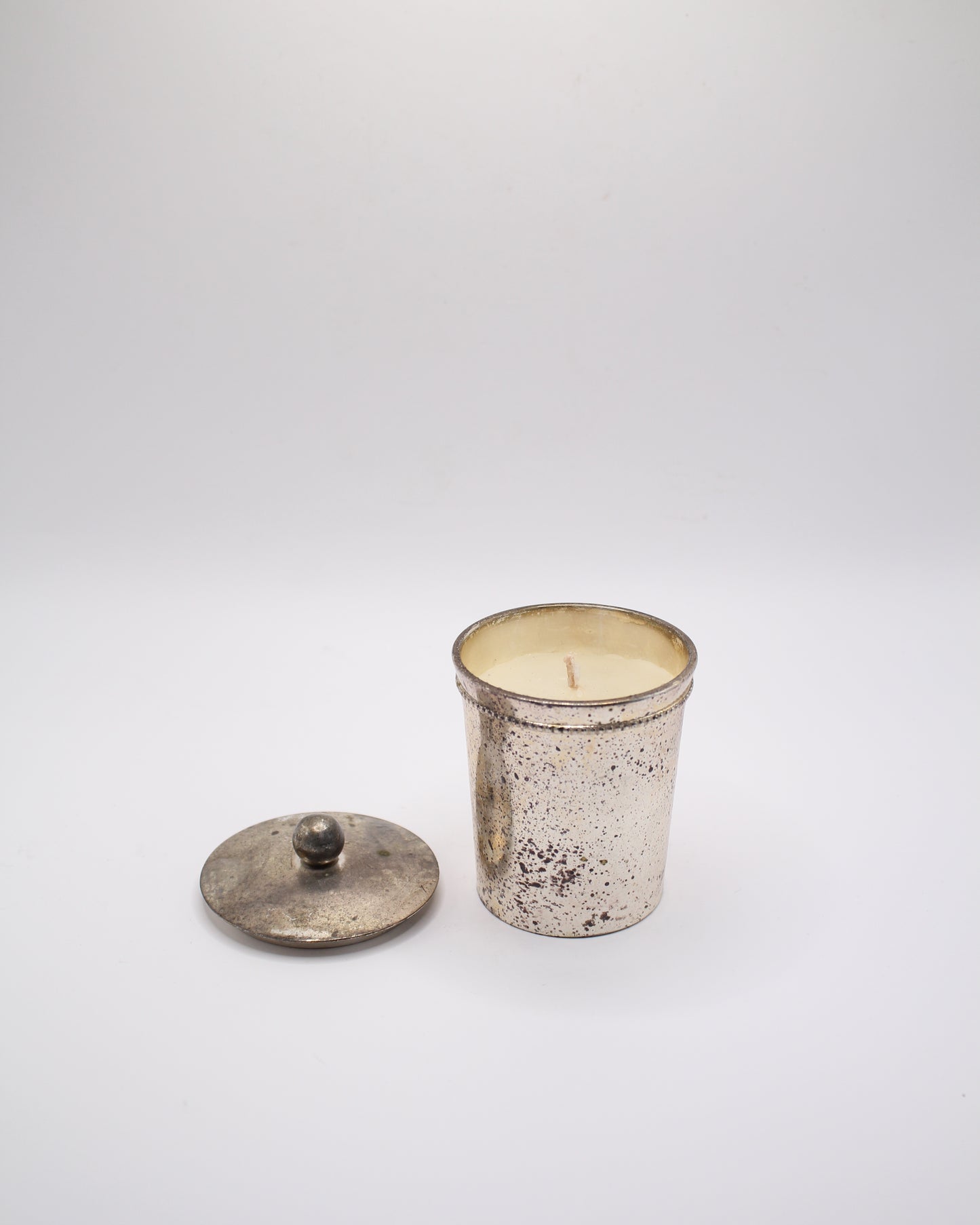 silver lidded candle