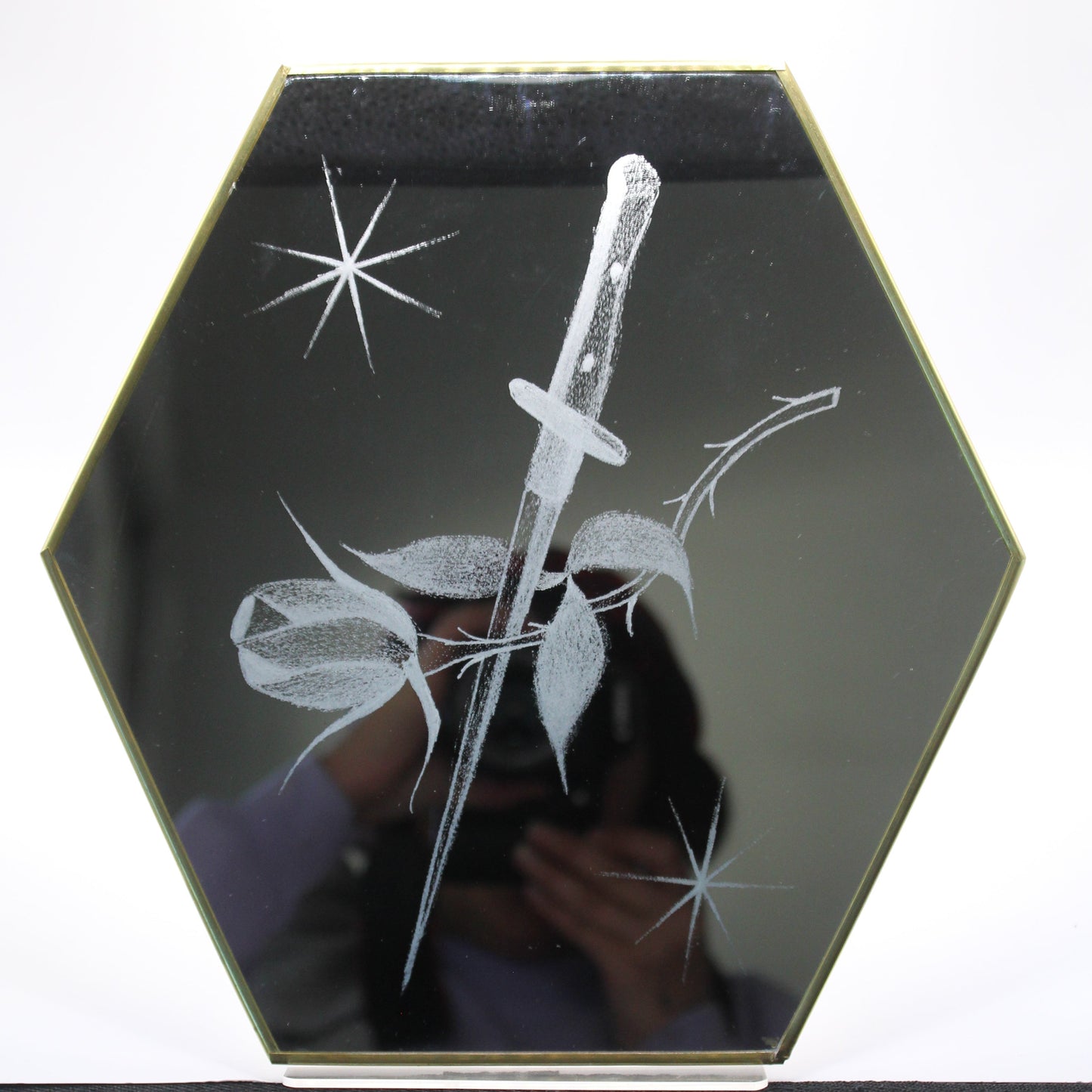 sword and rose tattooed mirror