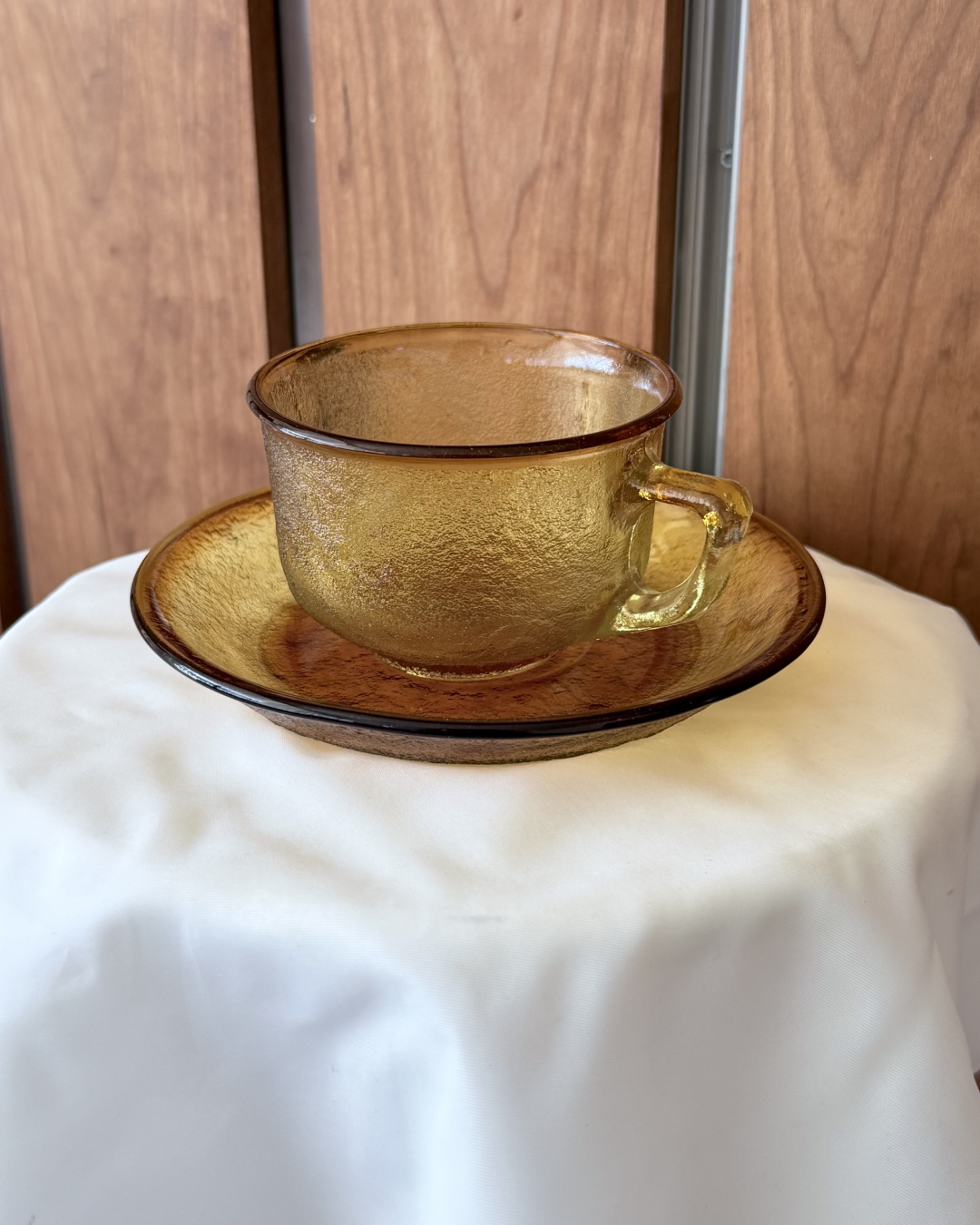 Light Textured Amber Glass Cup and Saucer