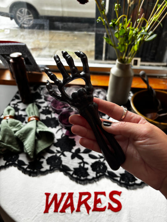 Skeleton Hand Cast Iron Bottle Opener